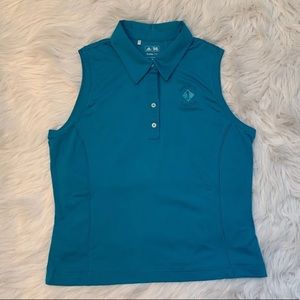 Sleeveless womens Adidas golf top in teal blue.